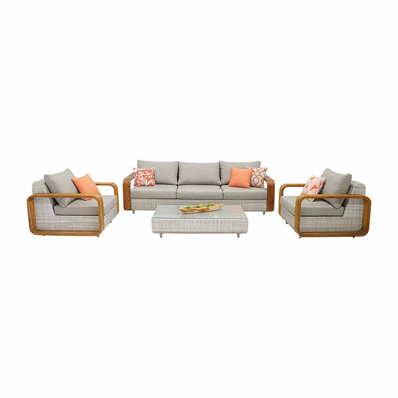 Rossland outdoor lounge collection featuring a wicker lounge chair, 2-seater, 3-seater, 4-seater and 5-seater sofas with teak arms and orange pillows, set in a serene outdoor oasis.