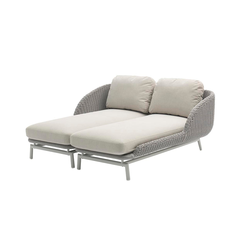 Comfortable chaise lounge, set on a plain white background, offering both style and functionality for a peaceful outdoor living space.