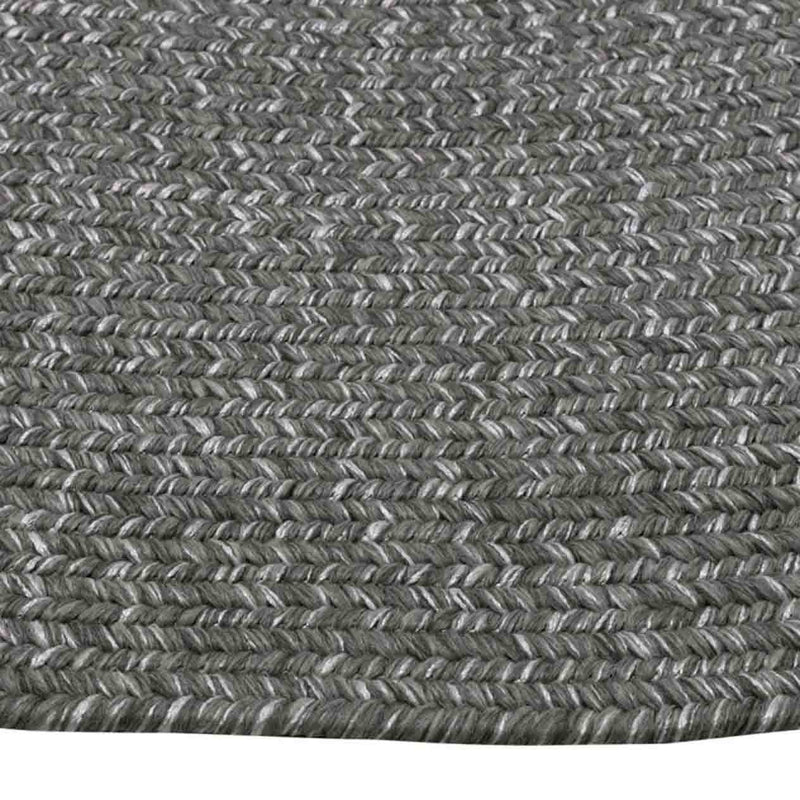Extreme close-up of a grey rug, showcasing detailed pattern, set against a plain white background, complementing outdoor furniture.
