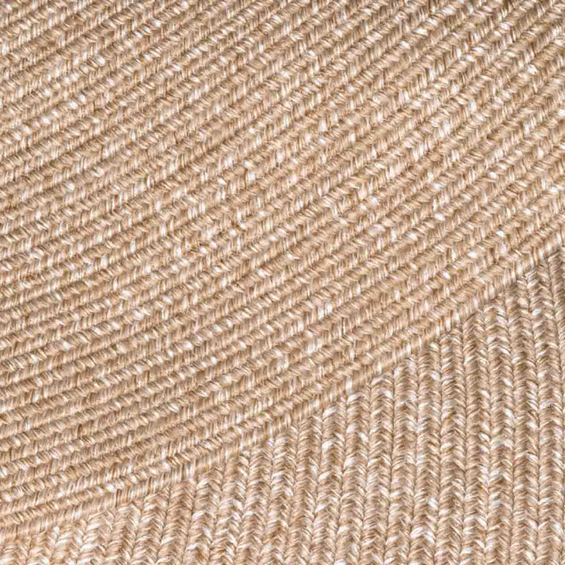 Extreme close-up of a light-brown rug, showing detailed pattern, ideal for outdoor furniture settings.