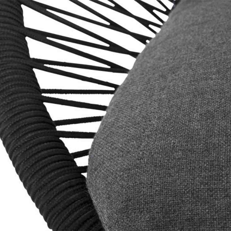 Close-up on the rope design & upholstery of a black & grey outdoor rope lounge from the &