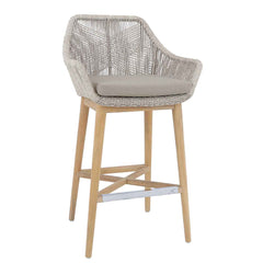 White & grey wicker outdoor bar stool with teak legs displayed on a plain white background, viewed from a front angle.