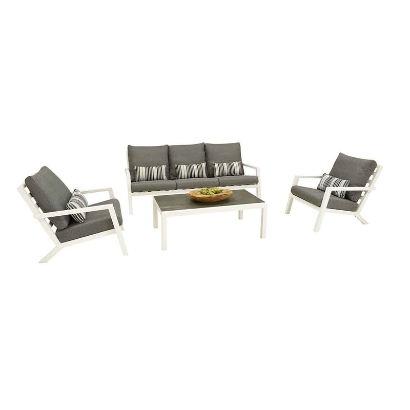 Aluminium outdoor furniture set from Toronto Outdoor Range, featuring outdoor lounge with armchair, 3-seater, footrest, and coffee table with a bowl of fruit.