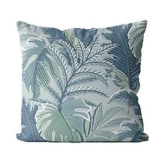 Tropic outdoor scatter cushion with leaf designs in grey, blue, and green, set against a plain white background
