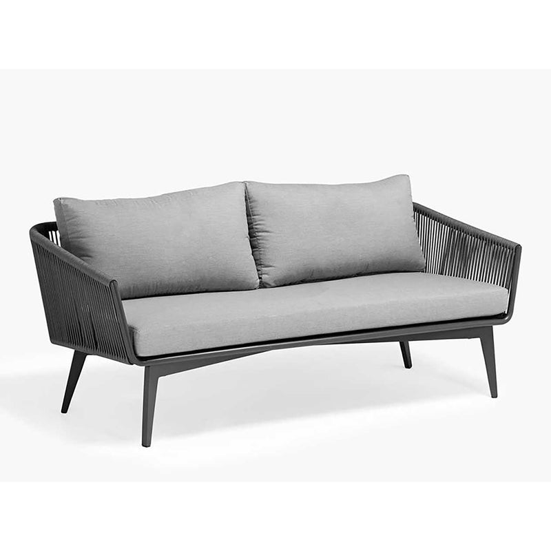 Outdoor furniture Truro Rope Series featuring a gray outdoor lounge rope chair with two pillows.