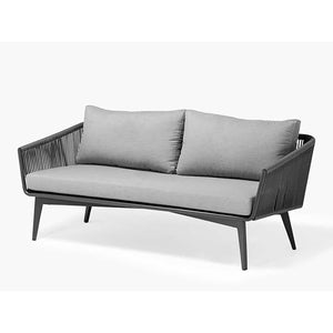 Outdoor furniture Truro Rope Series featuring a gray outdoor lounge rope chair with two pillows.