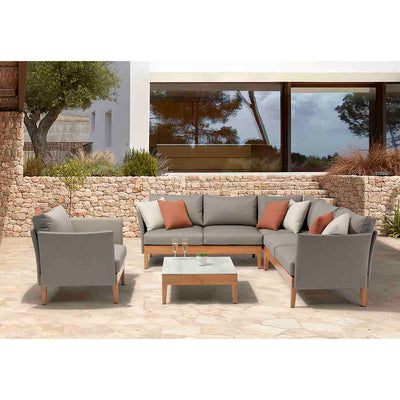 Grey & brown Belfast Outdoor Armchair, 6 Seater Outdoor Lounge, and Square Coffee Table set on an outdoor area of a modern house, creating a stylish outdoor living space perfect for relaxation.