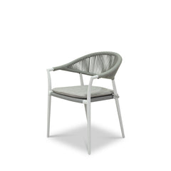 A close up of a rope dining chair with white frame and light grey fabric set against a white background. Outdoor furniture, outdoor dining furniture, Windsor Dining Chair.