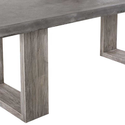 Zen concrete table with customizable Teak or metal legs, perfect for outdoor furniture settings.