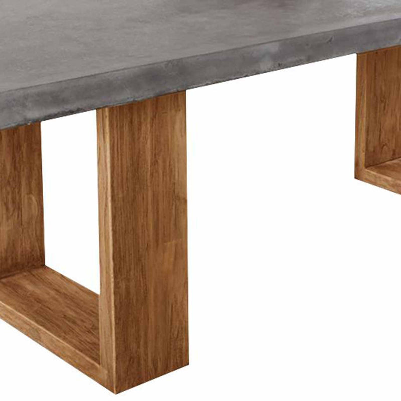 Zen concrete table with customizable Teak or metal legs, perfect for outdoor furniture settings.