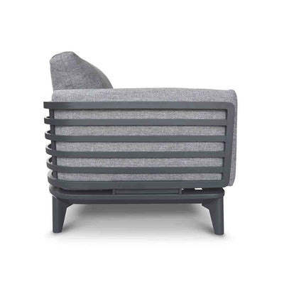 Outdoor furniture: An Aluminium armchair with charcoal frame and plush charcoal cushions set against a white background.