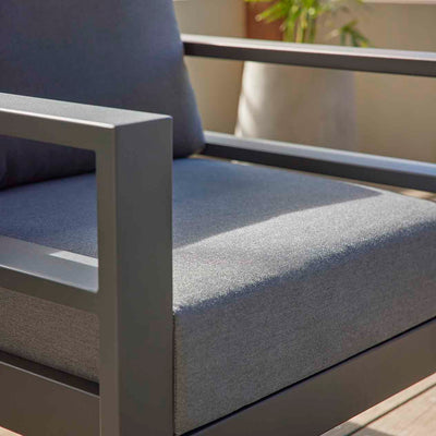 Albury outdoor furniture collection featuring outdoor chairs and aluminium outdoor furniture, including a grey chair with a blue cushion on a wooden deck.