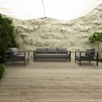 Albury outdoor furniture collection on a patio, including an outdoor lounge, armchair, and aluminium outdoor furniture with a table.