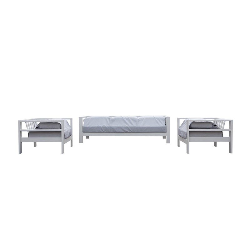 Albury outdoor furniture collection featuring a white couch and a bed in a room, including an armchair, 2-seater, 3-seater, and modular settings in premium Spanish Agora fabric, complete with a waterproof lounge cover.